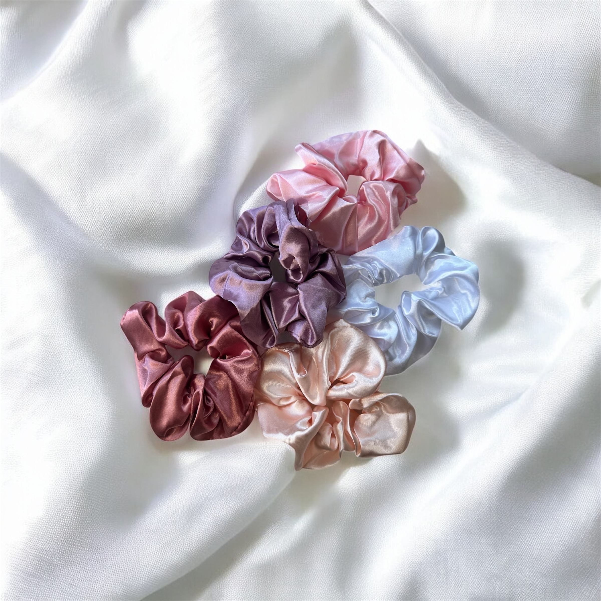 Lot de chouchous en satin couleurs pastels et rose